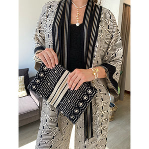 Aggel Clutch Bag